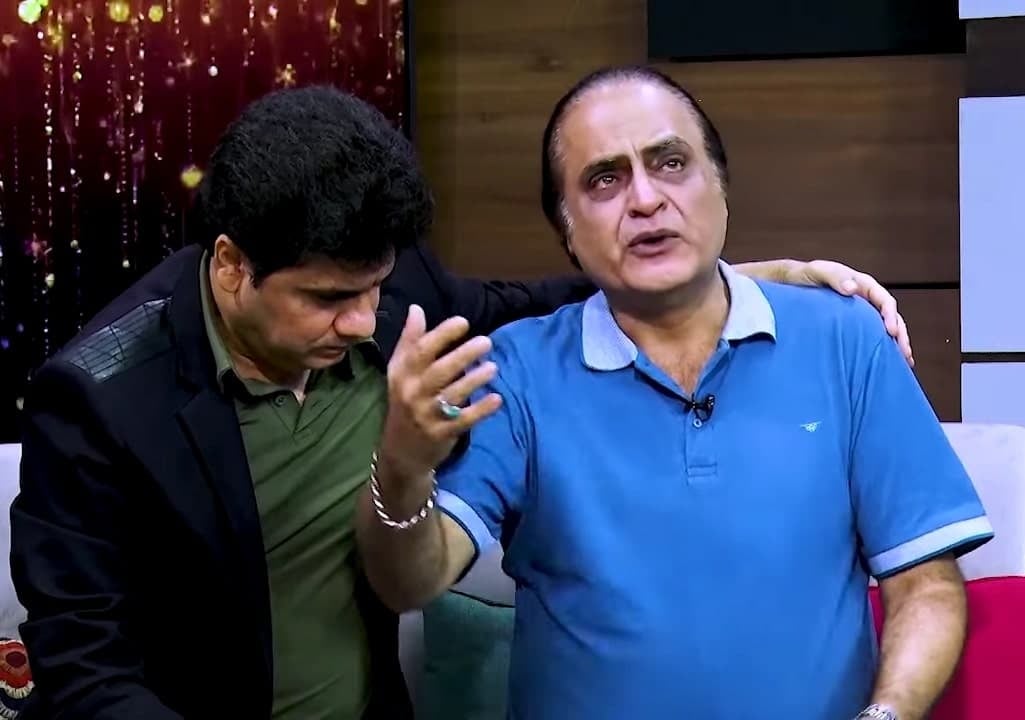 Mehmood Aslam Reflecting on Life's Heartaches